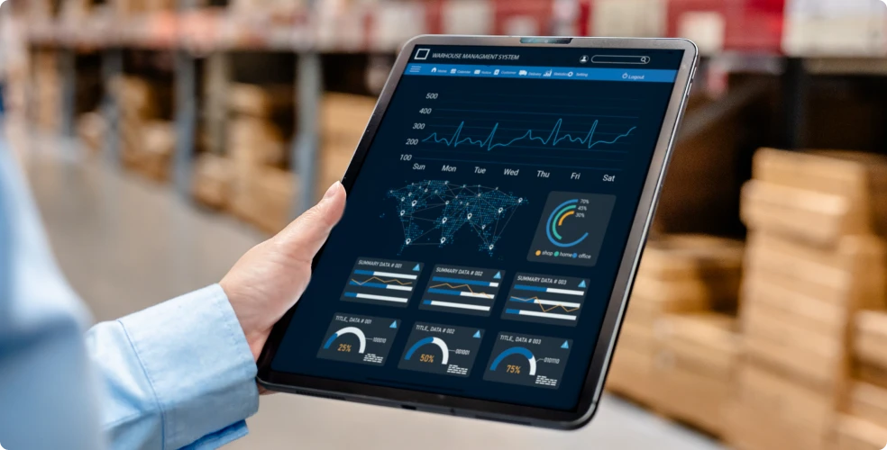 Person viewing data dashboard on tablet