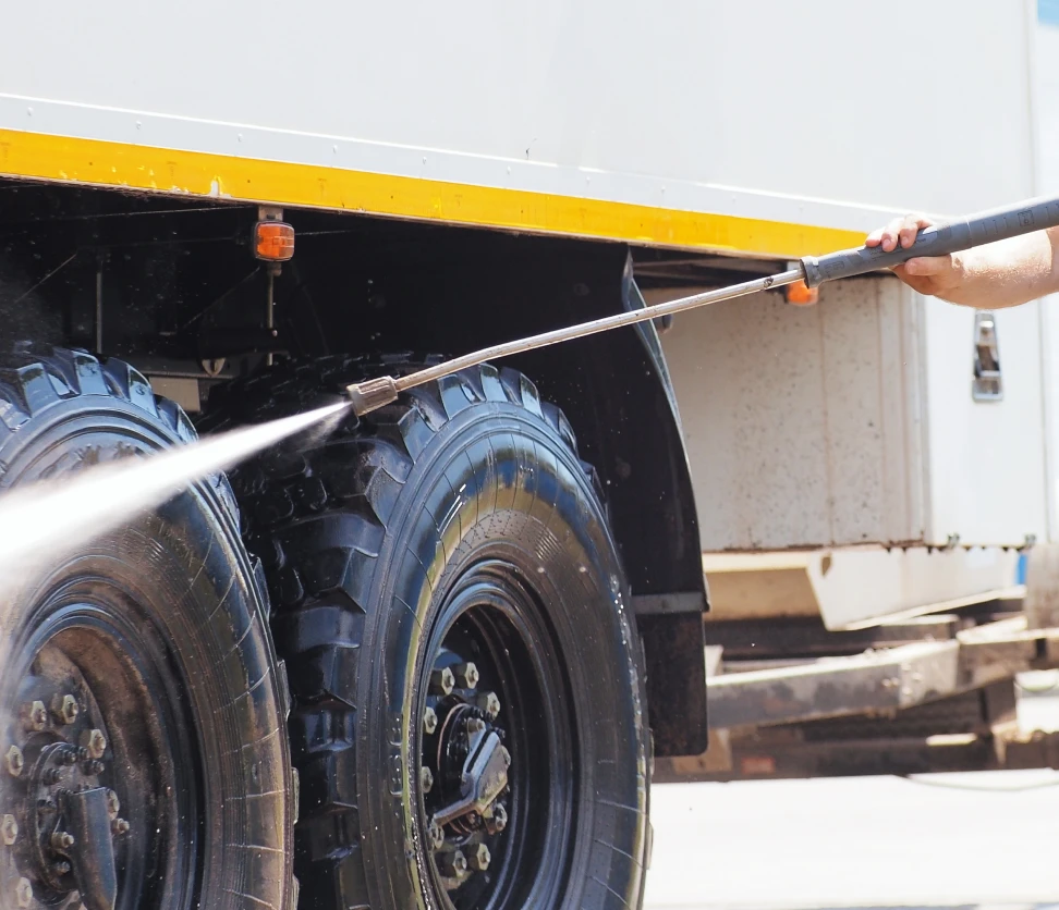 Pressure washing truck wheels